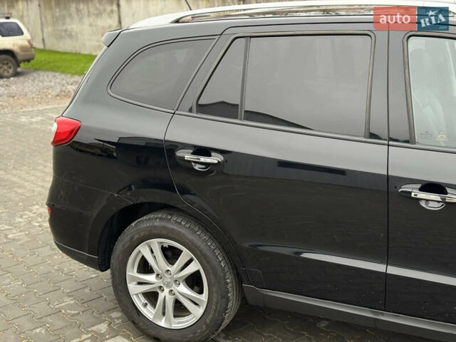 Черный Хендай Санта Фе, объемом двигателя 2.2 л и пробегом 219 тыс. км за 13950 $, фото 8 на Automoto.ua