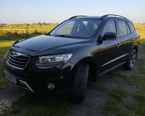 Черный Хендай Санта Фе, объемом двигателя 2.2 л и пробегом 171 тыс. км за 14800 $, фото 1 на Automoto.ua