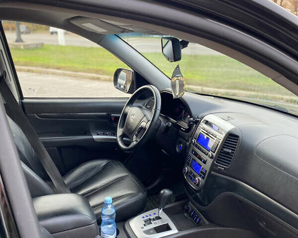 Черный Хендай Санта Фе, объемом двигателя 2.2 л и пробегом 229 тыс. км за 12499 $, фото 5 на Automoto.ua