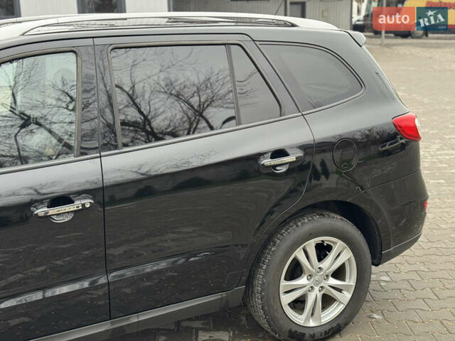 Черный Хендай Санта Фе, объемом двигателя 2.2 л и пробегом 219 тыс. км за 13950 $, фото 21 на Automoto.ua