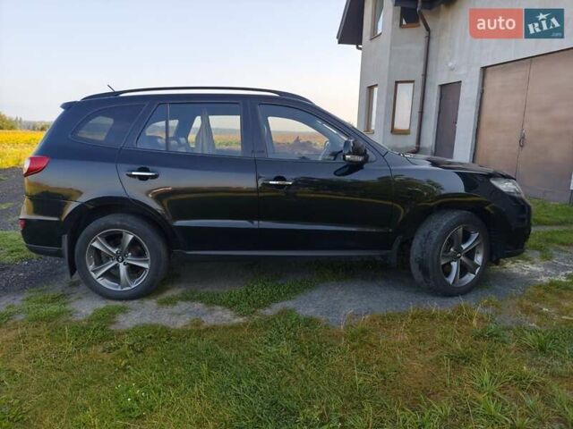 Черный Хендай Санта Фе, объемом двигателя 2.2 л и пробегом 171 тыс. км за 14800 $, фото 3 на Automoto.ua