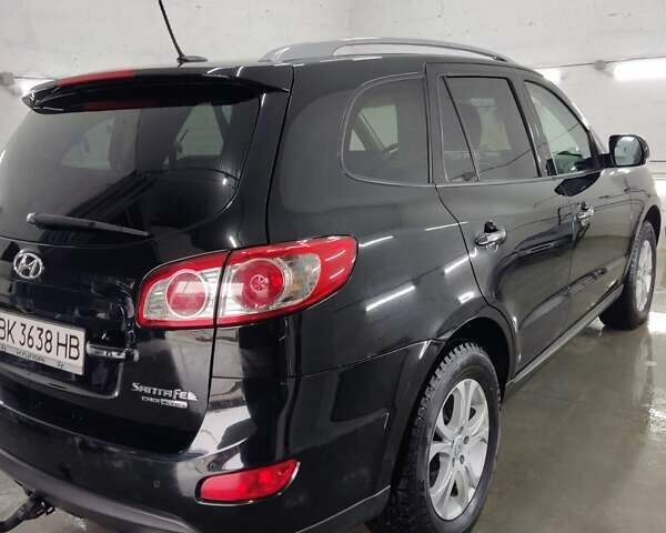 Черный Хендай Санта Фе, объемом двигателя 2.2 л и пробегом 287 тыс. км за 13700 $, фото 15 на Automoto.ua
