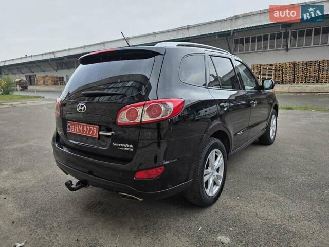 Черный Хендай Санта Фе, объемом двигателя 2.2 л и пробегом 232 тыс. км за 15099 $, фото 7 на Automoto.ua