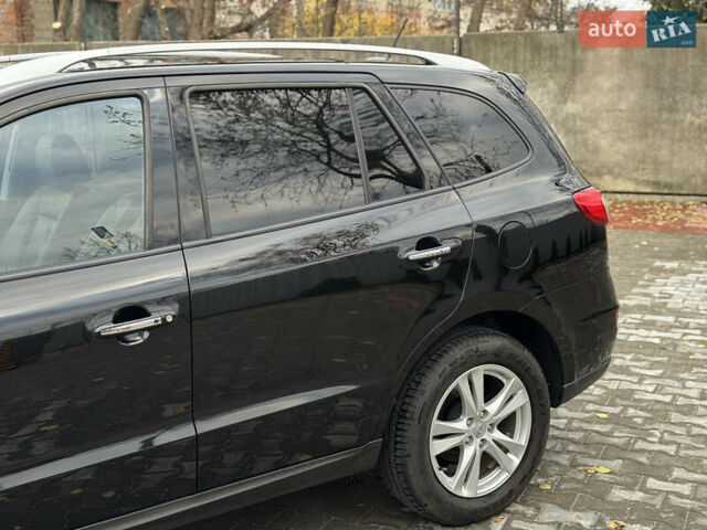 Черный Хендай Санта Фе, объемом двигателя 2.2 л и пробегом 218 тыс. км за 13900 $, фото 13 на Automoto.ua