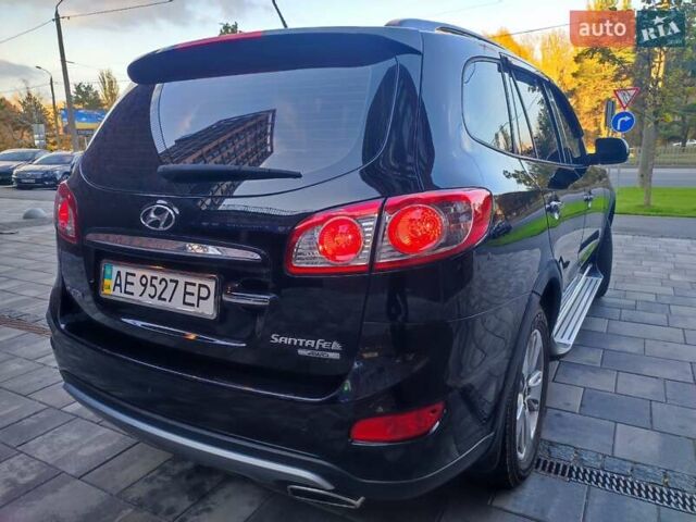 Чорний Хендай Санта Фе, об'ємом двигуна 2.36 л та пробігом 131 тис. км за 12600 $, фото 1 на Automoto.ua