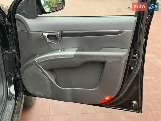 Черный Хендай Санта Фе, объемом двигателя 2.2 л и пробегом 170 тыс. км за 13900 $, фото 22 на Automoto.ua