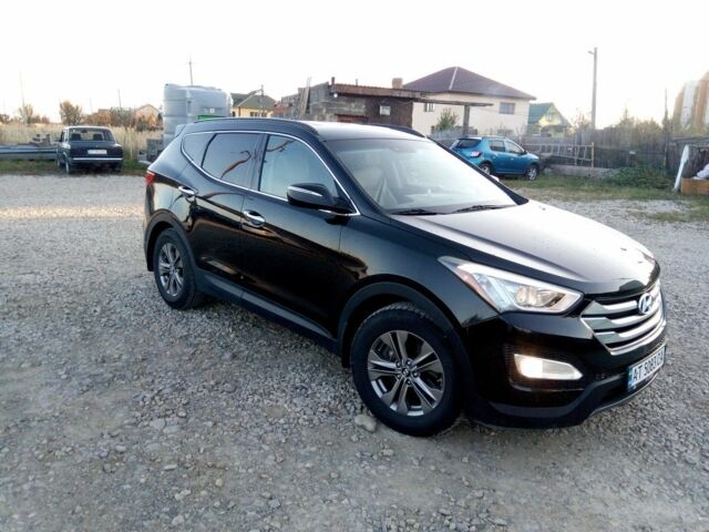 Черный Хендай Санта Фе, объемом двигателя 2.4 л и пробегом 136 тыс. км за 13669 $, фото 1 на Automoto.ua