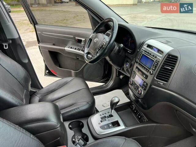 Черный Хендай Санта Фе, объемом двигателя 2.2 л и пробегом 190 тыс. км за 14300 $, фото 87 на Automoto.ua
