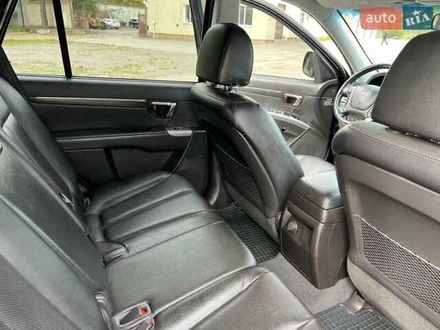 Черный Хендай Санта Фе, объемом двигателя 2.2 л и пробегом 190 тыс. км за 14300 $, фото 94 на Automoto.ua