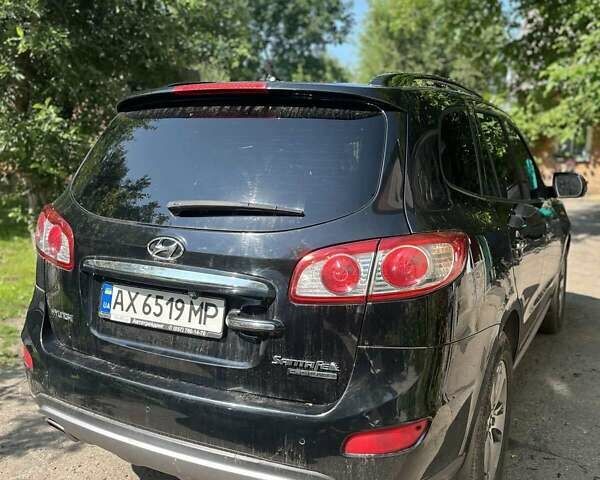 Черный Хендай Санта Фе, объемом двигателя 2.2 л и пробегом 206 тыс. км за 13500 $, фото 6 на Automoto.ua