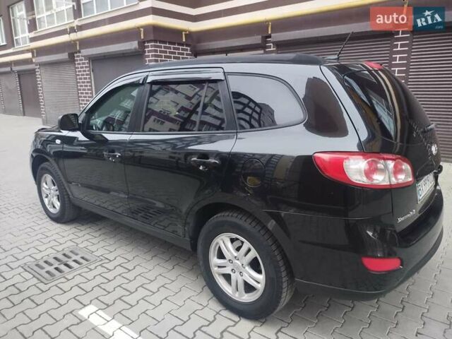 Черный Хендай Санта Фе, объемом двигателя 2.36 л и пробегом 264 тыс. км за 10200 $, фото 16 на Automoto.ua