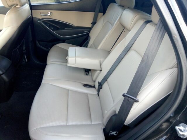 Черный Хендай Санта Фе, объемом двигателя 2.4 л и пробегом 136 тыс. км за 13669 $, фото 6 на Automoto.ua