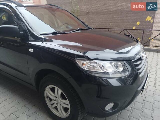 Черный Хендай Санта Фе, объемом двигателя 2.36 л и пробегом 264 тыс. км за 10200 $, фото 18 на Automoto.ua