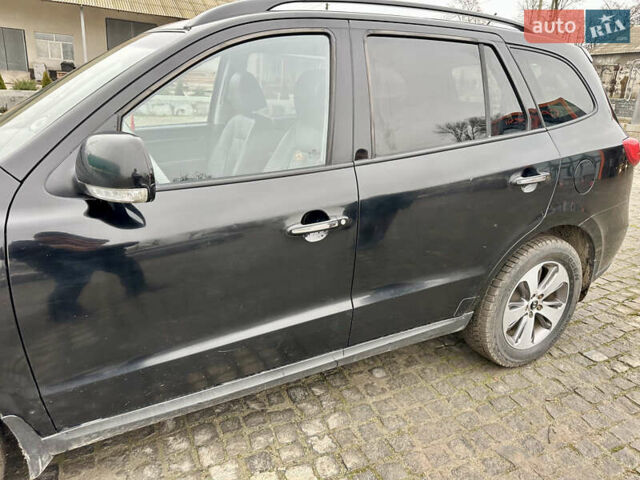 Черный Хендай Санта Фе, объемом двигателя 2.2 л и пробегом 310 тыс. км за 12900 $, фото 13 на Automoto.ua