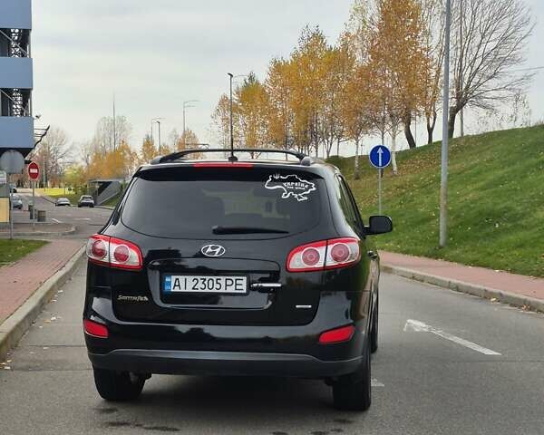 Чорний Хендай Санта Фе, об'ємом двигуна 2.4 л та пробігом 221 тис. км за 12700 $, фото 9 на Automoto.ua