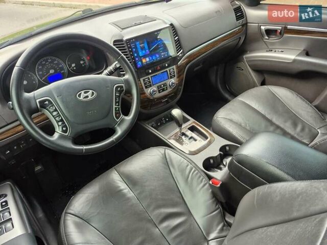 Чорний Хендай Санта Фе, об'ємом двигуна 2.4 л та пробігом 221 тис. км за 12700 $, фото 12 на Automoto.ua