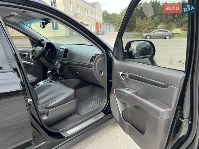 Черный Хендай Санта Фе, объемом двигателя 2.2 л и пробегом 190 тыс. км за 14300 $, фото 82 на Automoto.ua