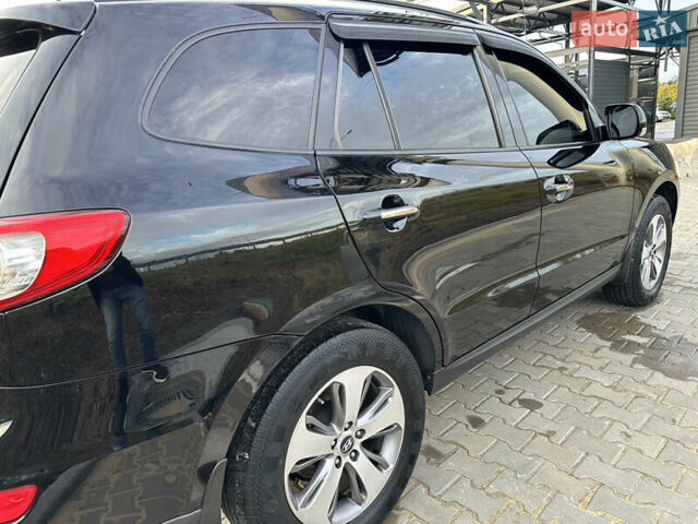 Черный Хендай Санта Фе, объемом двигателя 2.2 л и пробегом 320 тыс. км за 14500 $, фото 11 на Automoto.ua