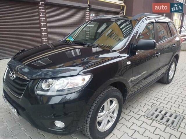 Черный Хендай Санта Фе, объемом двигателя 2.36 л и пробегом 264 тыс. км за 10200 $, фото 15 на Automoto.ua