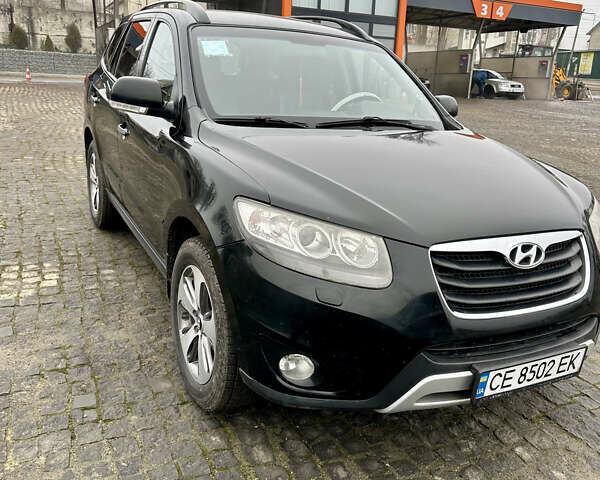 Черный Хендай Санта Фе, объемом двигателя 2.2 л и пробегом 310 тыс. км за 12900 $, фото 1 на Automoto.ua