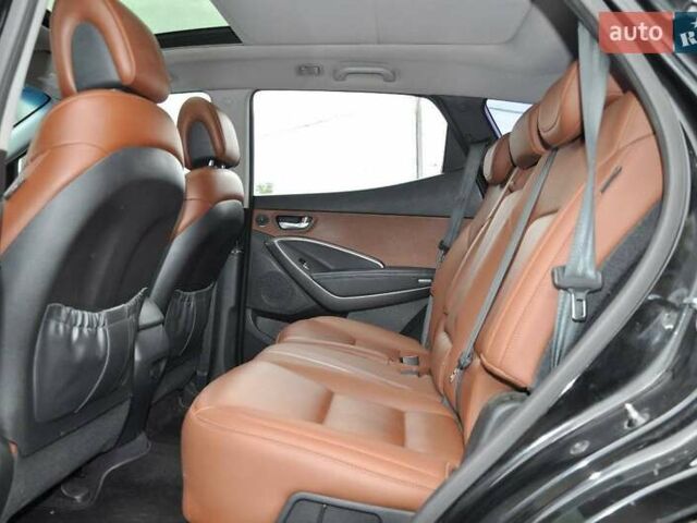 Черный Хендай Санта Фе, объемом двигателя 2.36 л и пробегом 181 тыс. км за 13300 $, фото 5 на Automoto.ua