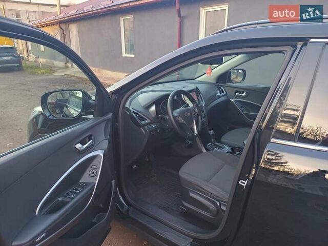 Черный Хендай Санта Фе, объемом двигателя 2.36 л и пробегом 223 тыс. км за 14800 $, фото 18 на Automoto.ua