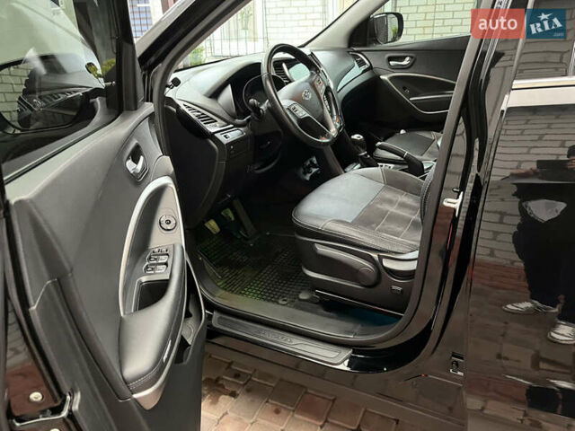 Черный Хендай Санта Фе, объемом двигателя 2.36 л и пробегом 166 тыс. км за 15000 $, фото 11 на Automoto.ua