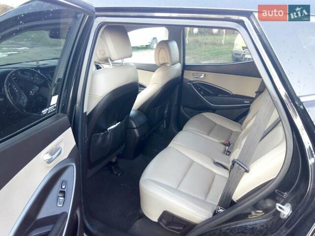 Черный Хендай Санта Фе, объемом двигателя 2.4 л и пробегом 136 тыс. км за 13750 $, фото 13 на Automoto.ua