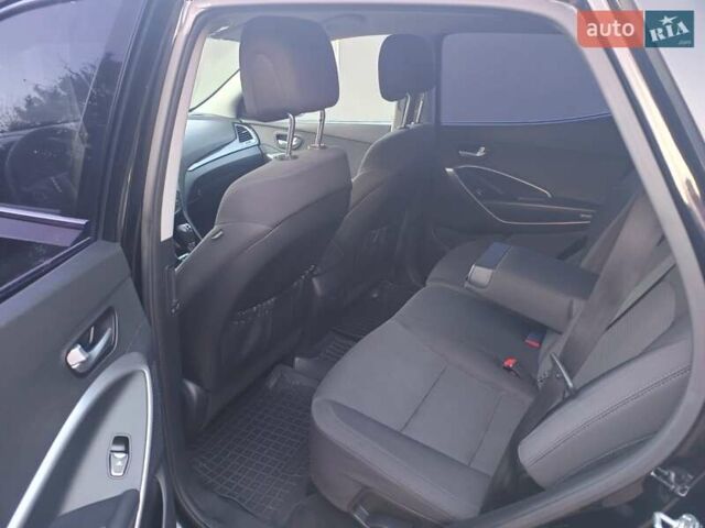 Черный Хендай Санта Фе, объемом двигателя 2.36 л и пробегом 223 тыс. км за 14800 $, фото 9 на Automoto.ua