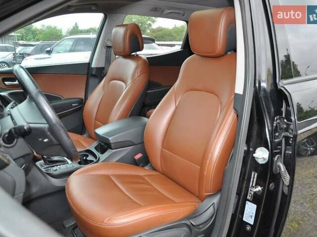 Черный Хендай Санта Фе, объемом двигателя 2.36 л и пробегом 181 тыс. км за 13300 $, фото 4 на Automoto.ua