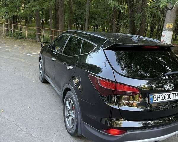 Черный Хендай Санта Фе, объемом двигателя 2.4 л и пробегом 158 тыс. км за 14500 $, фото 4 на Automoto.ua