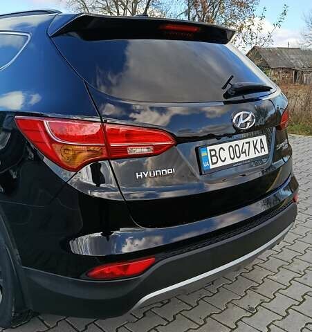 Черный Хендай Санта Фе, объемом двигателя 1.99 л и пробегом 182 тыс. км за 17499 $, фото 12 на Automoto.ua