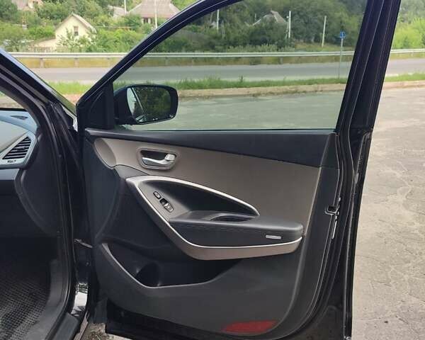 Черный Хендай Санта Фе, объемом двигателя 2.36 л и пробегом 168 тыс. км за 13000 $, фото 14 на Automoto.ua