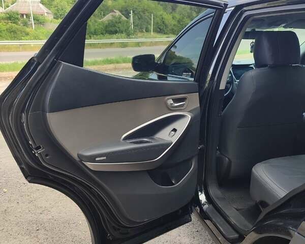 Черный Хендай Санта Фе, объемом двигателя 2.36 л и пробегом 168 тыс. км за 13000 $, фото 13 на Automoto.ua