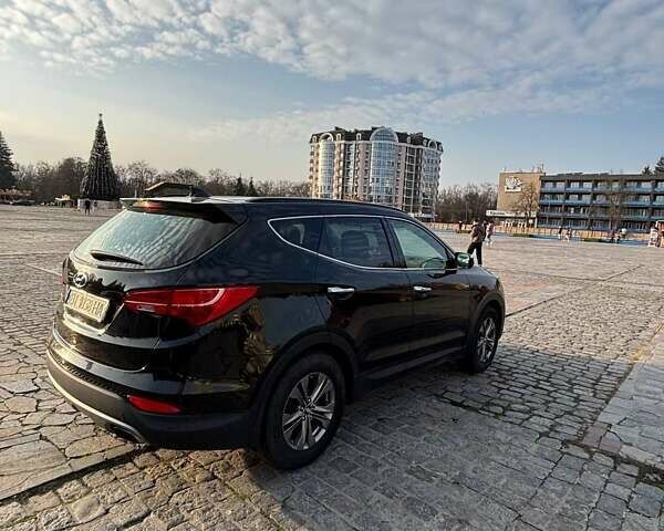 Черный Хендай Санта Фе, объемом двигателя 2.36 л и пробегом 162 тыс. км за 13900 $, фото 5 на Automoto.ua
