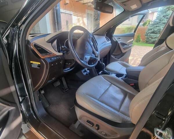 Черный Хендай Санта Фе, объемом двигателя 2 л и пробегом 141 тыс. км за 12800 $, фото 4 на Automoto.ua