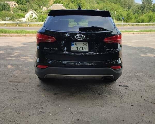 Черный Хендай Санта Фе, объемом двигателя 2.36 л и пробегом 168 тыс. км за 13000 $, фото 1 на Automoto.ua