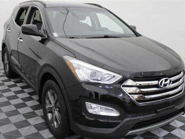 Чорний Хендай Санта Фе, об'ємом двигуна 2.4 л та пробігом 116 тис. км за 12000 $, фото 1 на Automoto.ua