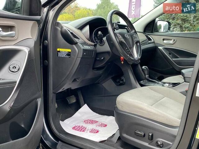 Черный Хендай Санта Фе, объемом двигателя 2.36 л и пробегом 150 тыс. км за 12700 $, фото 8 на Automoto.ua