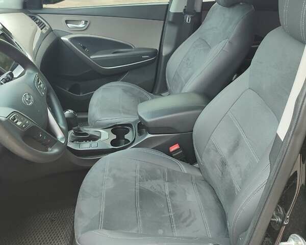 Черный Хендай Санта Фе, объемом двигателя 2.36 л и пробегом 168 тыс. км за 13000 $, фото 16 на Automoto.ua