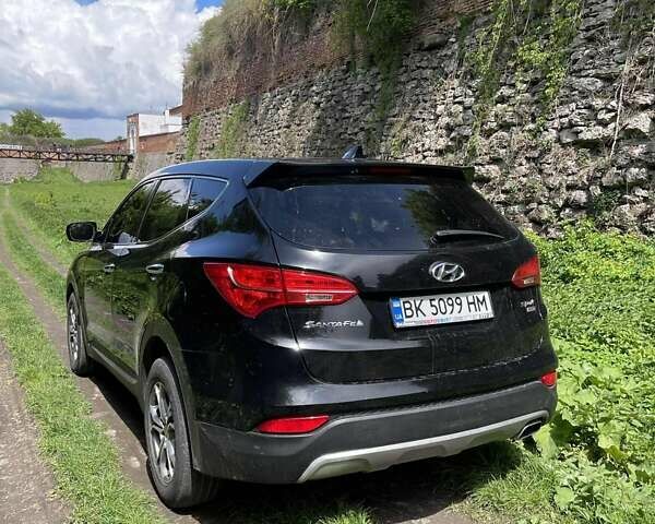 Черный Хендай Санта Фе, объемом двигателя 2.4 л и пробегом 164 тыс. км за 13500 $, фото 4 на Automoto.ua