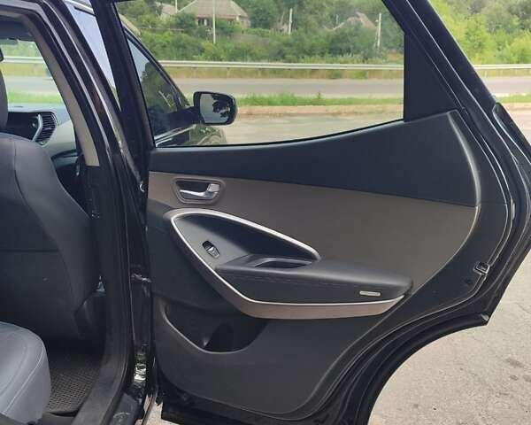 Черный Хендай Санта Фе, объемом двигателя 2.36 л и пробегом 168 тыс. км за 13000 $, фото 15 на Automoto.ua