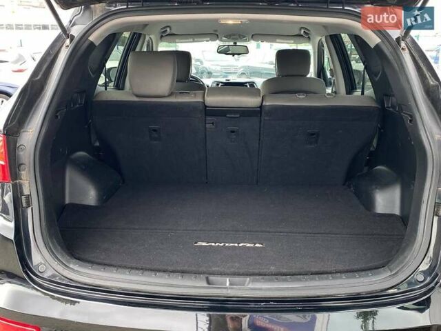 Черный Хендай Санта Фе, объемом двигателя 2.36 л и пробегом 150 тыс. км за 12700 $, фото 15 на Automoto.ua