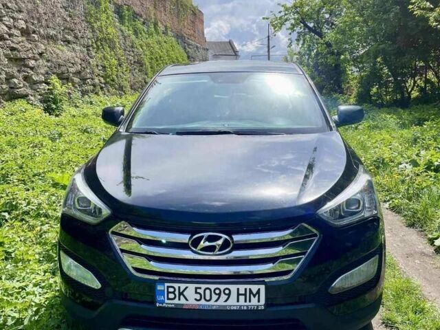 Черный Хендай Санта Фе, объемом двигателя 2.4 л и пробегом 164 тыс. км за 13500 $, фото 1 на Automoto.ua