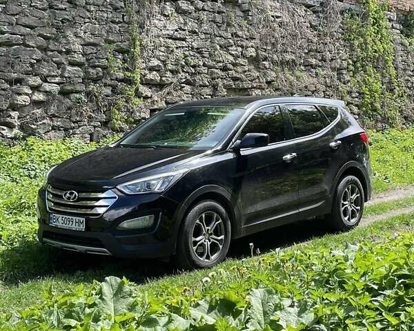 Черный Хендай Санта Фе, объемом двигателя 2.4 л и пробегом 164 тыс. км за 13500 $, фото 2 на Automoto.ua