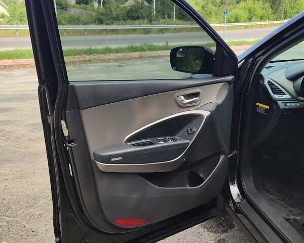 Черный Хендай Санта Фе, объемом двигателя 2.36 л и пробегом 168 тыс. км за 13000 $, фото 12 на Automoto.ua