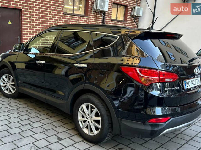 Чорний Хендай Санта Фе, об'ємом двигуна 2 л та пробігом 126 тис. км за 17500 $, фото 2 на Automoto.ua