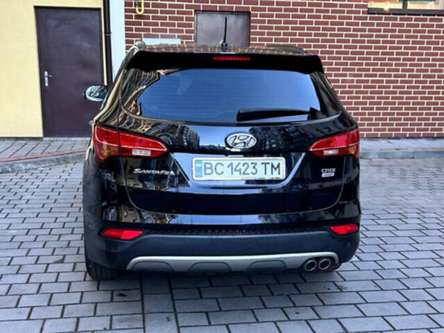 Чорний Хендай Санта Фе, об'ємом двигуна 2 л та пробігом 126 тис. км за 17500 $, фото 1 на Automoto.ua