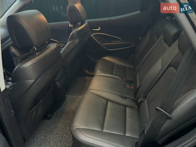 Черный Хендай Санта Фе, объемом двигателя 2 л и пробегом 180 тыс. км за 18200 $, фото 6 на Automoto.ua