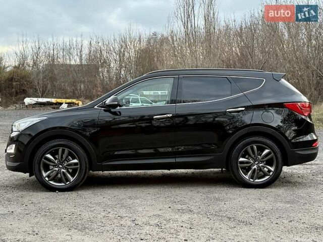 Черный Хендай Санта Фе, объемом двигателя 2.2 л и пробегом 129 тыс. км за 21877 $, фото 1 на Automoto.ua